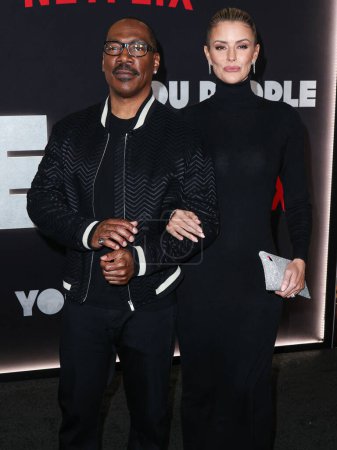 Photo for Eddie Murphy and girlfriend Paige Butcher arrive at the Los Angeles Premiere Of Netflix's 'You People' held at the Regency Village Theatre on January 17, 2023 in Westwood, Los Angeles, California, United States. - Royalty Free Image
