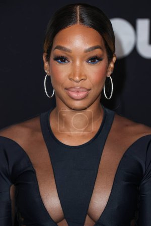 Téléchargez les photos : American actress and television personality Malika Haqq arrives at the Los Angeles Premiere Of Netflix's 'You People' held at the Regency Village Theatre on January 17, 2023 in Westwood, Los Angeles, California, United States. - en image libre de droit