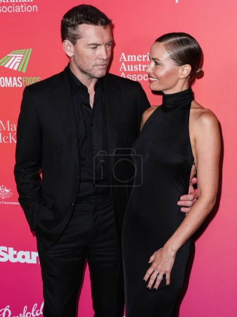 Photo for Australian actor Sam Worthington and wife/Australian model Lara Worthington arrive at the G'Day USA Arts Gala 2023 held at the Skirball Cultural Center on January 28, 2023 in Los Angeles, California, United States. - Royalty Free Image