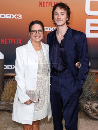 Photo for Jodi Ballard Hutto and son Drew Starkey arrive at the Los Angeles Premiere Of Netflix's 'Outer Banks' Season 3 held at the Regency Village Theatre on February 16, 2023 in Westwood, Los Angeles, California, United States. - Royalty Free Image