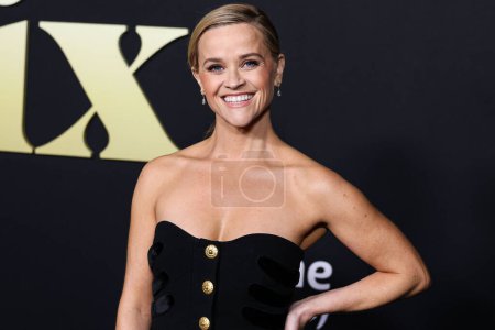 Photo for American actress Reese Witherspoon wearing a Schiaparelli dress and Reza jewelry arrives at the Los Angeles Premiere Of Amazon Prime Video's 'Daisy Jones & The Six' Season 1 held at the TCL Chinese Theatre IMAX on February 23, 2023 in Hollywood - Royalty Free Image