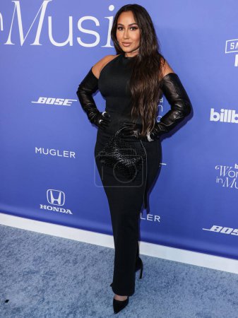 Photo for Adrienne Bailon Houghton arrives at the 2023 Billboard Women In Music held at the YouTube Theater on March 1, 2023 in Inglewood, Los Angeles, California, United States. - Royalty Free Image