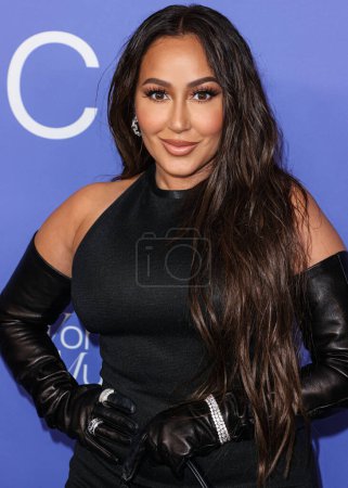 Photo for Adrienne Bailon Houghton arrives at the 2023 Billboard Women In Music held at the YouTube Theater on March 1, 2023 in Inglewood, Los Angeles, California, United States. - Royalty Free Image