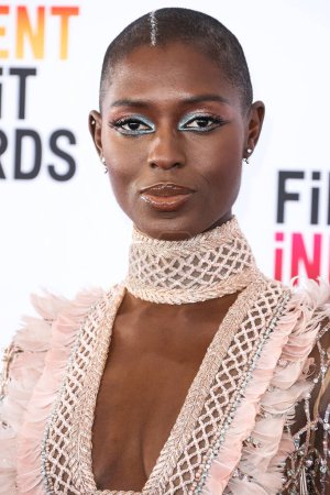 Photo for Jodie Turner-Smith wearing an Elie Saab Haute Couture dress and Anita Ko jewelry arrives at the 2023 Film Independent Spirit Awards held at the Santa Monica Beach on March 4, 2023 in Santa Monica, Los Angeles, California, United States. - Royalty Free Image
