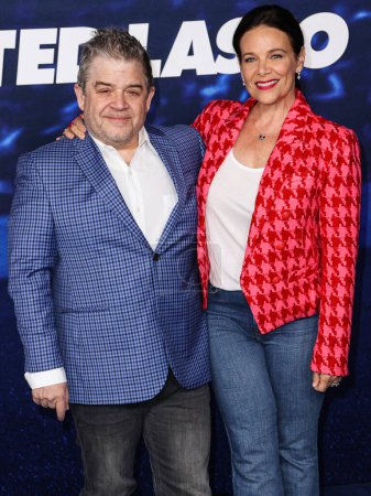 Photo for Patton Oswalt and Meredith Salenger arrive at the Los Angeles Premiere Of Apple TV+'s Original Series 'Ted Lasso' Season 3 held at the Regency Village Theatre on March 7, 2023 in Westwood, Los Angeles, California, United States. - Royalty Free Image