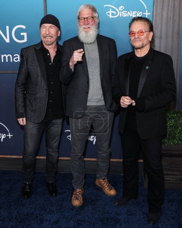Photo for Irish musician The Edge (David Howell Evans), American television host, comedian and producer Dave Letterman and Irish singer-songwriter, activist and philanthropist Bono (Paul David Hewson) at The Orpheum Theatre on March 8, 2023 in Los Angeles, USA - Royalty Free Image