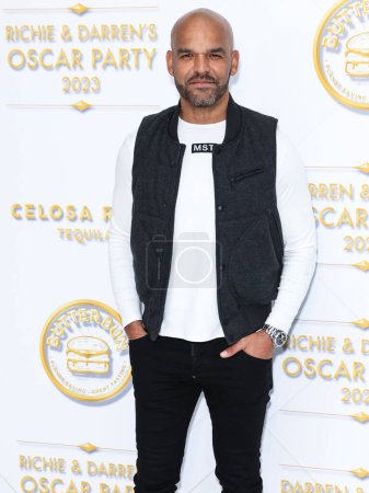 Photo for Puerto Rican actor Amaury Nolasco arrives at the Darren Dzienciol and Richie Akiva Oscar Party 2023 held at a Private Residence on March 10, 2023 in Bel Air, Los Angeles, California, United States. - Royalty Free Image