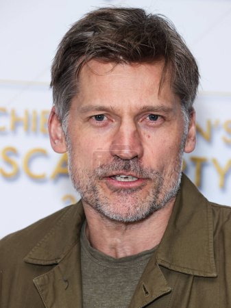 Photo for Danish actor and producer Nikolaj Coster-Waldau arrives at the Darren Dzienciol and Richie Akiva Oscar Party 2023 held at a Private Residence on March 10, 2023 in Bel Air, Los Angeles, California, United States. - Royalty Free Image