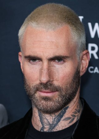 Photo for American singer Adam Levine of American pop rock band Maroon 5 arrives at The Women's Cancer Research Fund's An Unforgettable Evening Benefit Gala 2023 held at the Beverly Wilshire, A Four Seasons Hotel on March 16, 2023 in Beverly Hills, USA - Royalty Free Image