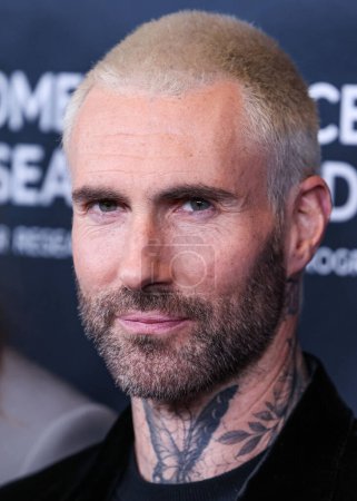 Photo for American singer Adam Levine of American pop rock band Maroon 5 arrives at The Women's Cancer Research Fund's An Unforgettable Evening Benefit Gala 2023 held at the Beverly Wilshire, A Four Seasons Hotel on March 16, 2023 in Beverly Hills, USA - Royalty Free Image