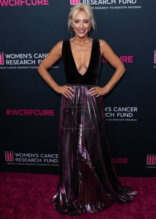 Foto de La actriz y modelo australiana Nicky Whelan llega a la gala benéfica inolvidable de The Women 's Cancer Research Fund, celebrada en Beverly Wilshire, A Four Seasons Hotel el 16 de marzo de 2023 en Beverly Hills, Los Ángeles, California, EE. UU. - Imagen libre de derechos