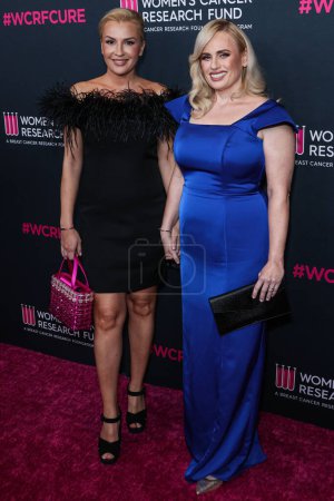 Photo for Ramona Agruma and girlfriend/Australian actress Rebel Wilson arrive at The Women's Cancer Research Fund's An Unforgettable Evening Benefit Gala 2023 at the Beverly Wilshire, A Four Seasons Hotel on  in Beverly Hills, Los Angeles, USA - Royalty Free Image
