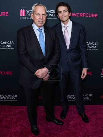 Photo for American film producer and businessman Steve Tisch and son Zachary Tisch arrive at The Women's Cancer Research Fund's An Unforgettable Evening Benefit Gala 2023 held at the Beverly Wilshire, A Four Seasons Hotel on March 16, 2023 in Beverly Hills, LA - Royalty Free Image