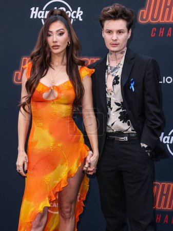 Photo for Francesca Farago and Jesse Sullivan arrive at the Los Angeles Premiere Of Lionsgate's 'John Wick: Chapter 4' held at the TCL Chinese Theatre IMAX on March 20, 2023 in Hollywood, Los Angeles, California, United States. - Royalty Free Image
