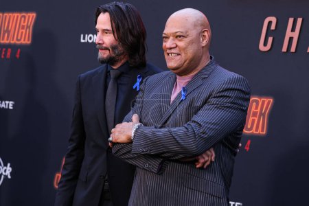 Photo for Keanu Reeves and Laurence Fishburne arrive at the Los Angeles Premiere Of Lionsgate's 'John Wick: Chapter 4' held at the TCL Chinese Theatre IMAX on March 20, 2023 in Hollywood, Los Angeles, California, United States. - Royalty Free Image