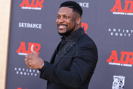 Photo for American stand-up comedian and actor Chris Tucker arrives at the World Premiere Of Amazon Studios' And Skydance Media's 'Air' held at the Regency Village Theatre on March 27, 2023 in Westwood, Los Angeles, California, United States. - Royalty Free Image