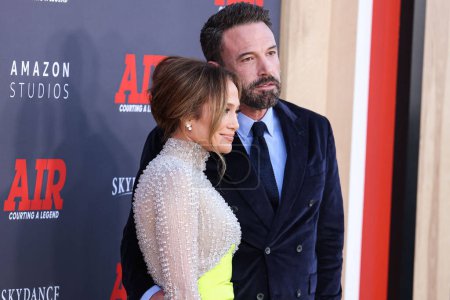 Photo for American singer Jennifer Lopez and husband/American actor and filmmaker Ben Affleck arrive at the World Premiere Of Amazon Studios' And Skydance Media's 'Air' held at the Regency Village Theatre on March 27, 2023 in Westwood, Los Angeles, USA - Royalty Free Image