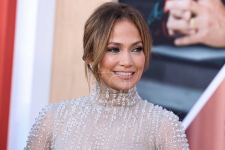 Photo for American actress, singer and dancer Jennifer Lopez wearing an Antonio Grimaldi dress and Shiphra jewelry arrives at the World Premiere Of Amazon Studios' And Skydance Media's 'Air' at the Regency Village Theatre on March 27, 2023 in Westwood, LA, USA - Royalty Free Image