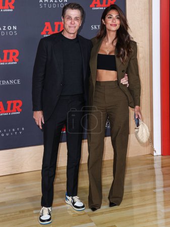 Photo for Patrick Whitesell and Pia Miller Whitesell arrive at the World Premiere Of Amazon Studios' And Skydance Media's 'Air' held at the Regency Village Theatre on March 27, 2023 in Westwood, Los Angeles, California, United States. - Royalty Free Image