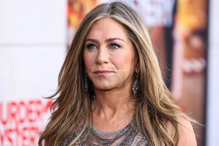 Photo for American actress and producer Jennifer Aniston wearing Versace arrives at the Los Angeles Premiere Of Netflix's 'Murder Mystery 2' held at the Regency Village Theatre on March 28, 2023 in Westwood, Los Angeles, California, United States. - Royalty Free Image