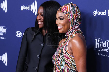 Téléchargez les photos : Zaya Wade et sa mère Gabrielle Union arrivent à la 34e édition annuelle des GLAAD Media Awards Los Angeles qui se tient au Beverly Hilton Hotel le 30 mars 2023 à Beverly Hills, Los Angeles, Californie, États-Unis. - en image libre de droit