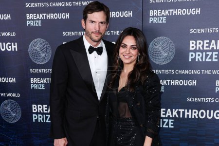 Photo for Ashton Kutcher and wife Mila Kunis arrive at the 9th Annual Breakthrough Prize Ceremony held at the Academy Museum of Motion Pictures on April 15, 2023 in Los Angeles, California, United States. - Royalty Free Image