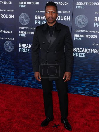 Photo for American actor and singer Leslie Odom Jr. arrives at the 9th Annual Breakthrough Prize Ceremony held at the Academy Museum of Motion Pictures on April 15, 2023 in Los Angeles, California, United States. - Royalty Free Image