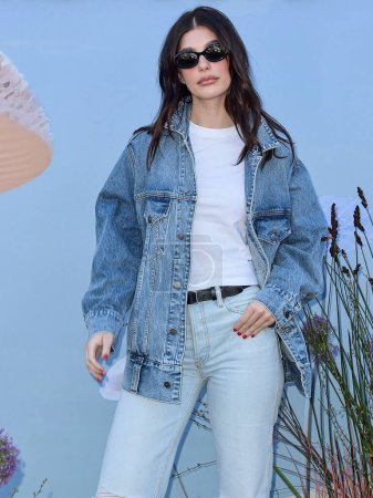 Photo for Camila Morrone arrives at the REVOLVE Festival 2023 celebrating the 20th Anniversary of REVOLVE in partnership with The h.wood Group on April 15, 2023 in Thermal, Coachella Valley, Riverside County, California, United States. - Royalty Free Image