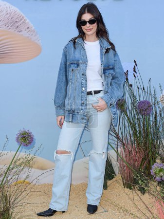 Photo for Camila Morrone arrives at the REVOLVE Festival 2023 celebrating the 20th Anniversary of REVOLVE in partnership with The h.wood Group on April 15, 2023 in Thermal, Coachella Valley, Riverside County, California, United States. - Royalty Free Image