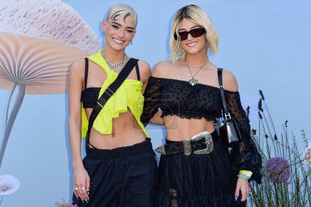 Photo for Dixie D'Amelio and sister Charli D'Amelio arrive at the REVOLVE Festival 2023 celebrating the 20th Anniversary of REVOLVE in partnership with The h.wood Group on April 15, 2023 in Thermal, Coachella Valley, Riverside County, California, United States - Royalty Free Image
