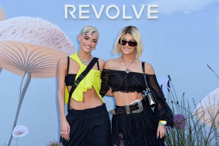 Photo for Dixie D'Amelio and sister Charli D'Amelio arrive at the REVOLVE Festival 2023 celebrating the 20th Anniversary of REVOLVE in partnership with The h.wood Group on April 15, 2023 in Thermal, Coachella Valley, Riverside County, California, United States - Royalty Free Image