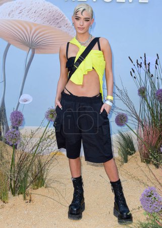 Photo for Dixie D'Amelio arrives at the REVOLVE Festival 2023 celebrating the 20th Anniversary of REVOLVE in partnership with The h.wood Group on April 15, 2023 in Thermal, Coachella Valley, Riverside County, California, United States. - Royalty Free Image