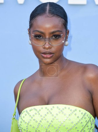 Photo for Justine Skye arrives at the REVOLVE Festival 2023 celebrating the 20th Anniversary of REVOLVE in partnership with The h.wood Group on April 15, 2023 in Thermal, Coachella Valley, Riverside County, California, United States. - Royalty Free Image
