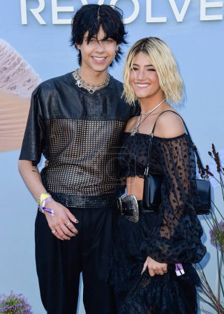 Photo for Landon Barker and girlfriend Charli D'Amelio arrive at the REVOLVE Festival 2023 celebrating the 20th Anniversary of REVOLVE in partnership with The h.wood Group on April 15, 2023 in Thermal, Coachella Valley, Riverside County, California, USA - Royalty Free Image