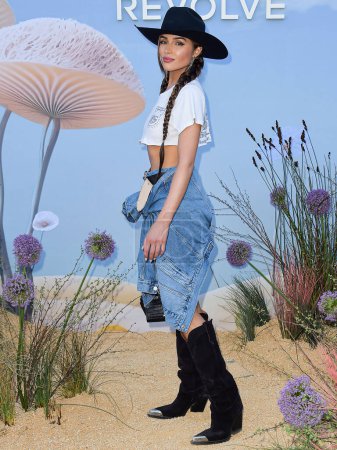 Photo for Olivia Culpo arrives at the REVOLVE Festival 2023 celebrating the 20th Anniversary of REVOLVE in partnership with The h.wood Group on April 15, 2023 in Thermal, Coachella Valley, Riverside County, California, United States. - Royalty Free Image
