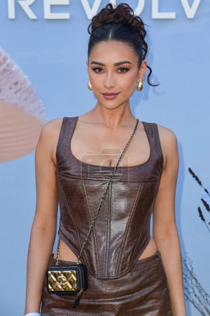 Photo for Shay Mitchell arrives at the REVOLVE Festival 2023 celebrating the 20th Anniversary of REVOLVE in partnership with The h.wood Group on April 15, 2023 in Thermal, Coachella Valley, Riverside County, California, United States. - Royalty Free Image