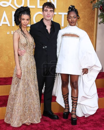 Photo for India Amarteifio, Corey Mylchreest and Arsema Thomas arrive at the World Premiere Screening Event Of Netflix's 'Queen Charlotte: A Bridgerton Story' Season 1 held at the Regency Village Theatre on April 26, 2023 in Westwood, Los Angeles, California - Royalty Free Image