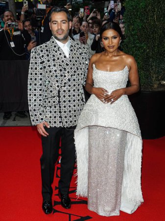 Photo for Jonathan Simkhai and Mindy Kaling depart The Mark Hotel for The 2023 Met Gala (2023 Costume Institute Benefit) Celebrating 'Karl Lagerfeld: A Line Of Beauty' at The Mark Hotel on May 1, 2023 in Manhattan, New York City, New York, United States. - Royalty Free Image