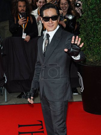 Photo for Ke Huy Quan departs The Mark Hotel for The 2023 Met Gala (2023 Costume Institute Benefit) Celebrating 'Karl Lagerfeld: A Line Of Beauty' at The Mark Hotel on May 1, 2023 in Manhattan, New York City, New York, United States. - Royalty Free Image