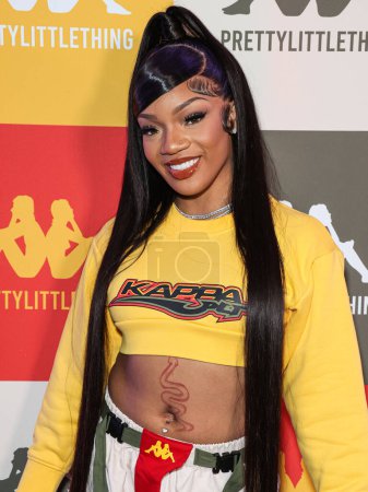 Photo for American rapper GloRilla (Gloria Hallelujah Woods) arrives at the PrettyLittleThing X Kappa Launch Party held at the Sunset Room Hollywood on May 9, 2023 in Hollywood, Los Angeles, California, United States - Royalty Free Image