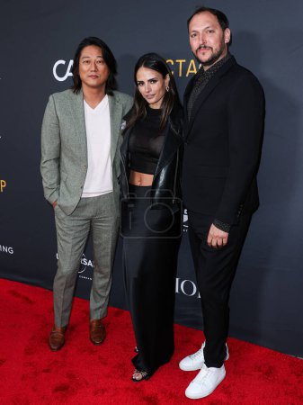 Photo for Sung Kang, Jordana Brewster and Louis Leterrier arrive at the Charlize Theron Africa Outreach Project (CTAOP) 2023 Block Party held at the Universal Studios Backlot on May 20, 2023 in Universal City, Los Angeles, California, United States. - Royalty Free Image