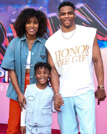 Photo for Nina Earl, Noah Russell Westbrook and Russell Westbrook arrive at the World Premiere Of Sony Pictures Animation's 'Spider-Man: Across The Spider Verse' held at the Regency Village Theater on May 30, 2023 in Westwood, Los Angeles, California - Royalty Free Image
