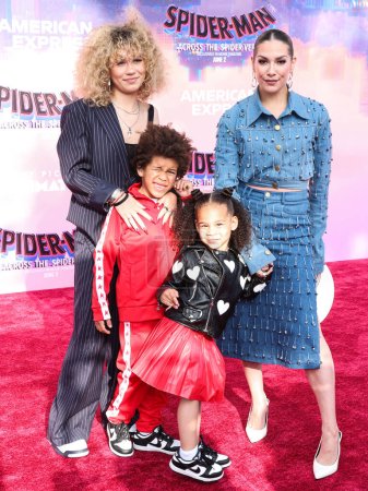 Photo for Weslie Boss, Maddox Boss, Zaia Boss and Allison Holker arrive at the World Premiere Of Sony Pictures Animation's 'Spider-Man: Across The Spider Verse' held at the Regency Village Theater on May 30, 2023 in Westwood, Los Angeles, California - Royalty Free Image