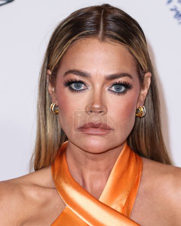 Photo for American actress, television personality and former fashion model Denise Richards arrives at the 30th Annual Race To Erase MS Gala held at the Fairmont Century Plaza on June 2, 2023 in Century City, Los Angeles, California, United States. - Royalty Free Image
