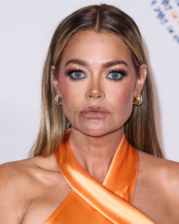 Photo for American actress, television personality and former fashion model Denise Richards arrives at the 30th Annual Race To Erase MS Gala held at the Fairmont Century Plaza on June 2, 2023 in Century City, Los Angeles, California, United States. - Royalty Free Image
