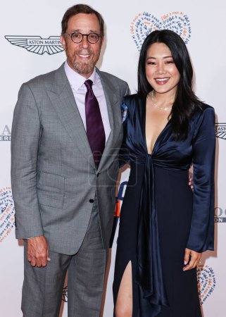 Photo for Rob Minkoff and wife Crystal Kung Minkoff arrive at the 30th Annual Race To Erase MS Gala held at the Fairmont Century Plaza on June 2, 2023 in Century City, Los Angeles, California, United States. - Royalty Free Image