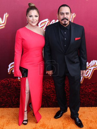 Photo for Yadi Valerio and husband Emilio Rivera arrive at the Los Angeles Special Screening Of Searchlight Pictures' 'Flamin' Hot' held at the Hollywood American Legion Post 43 at Hollywood Legion Theater on June 9, 2023 in Hollywood, Los Angeles, California - Royalty Free Image