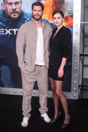 Photo for Liam Hemsworth and Gabrielle Brooks arrive at the New York Premiere Of Netflix's 'Extraction 2'  held at Jazz at Lincoln Center on June 12, 2023 in Manhattan, New York City, New York, United States. - Royalty Free Image