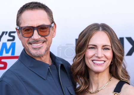 Photo for Actor and producer Robert Downey Jr. and wife/American film producer Susan Downey arrive at the Los Angeles Premiere Of MAX Original Series' 'Downey's Dream Cars' Season 1 held at the Petersen Automotive Museum on June 16, 2023 in Los Angeles - Royalty Free Image