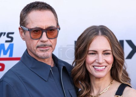 Photo for Actor and producer Robert Downey Jr. and wife/American film producer Susan Downey arrive at the Los Angeles Premiere Of MAX Original Series' 'Downey's Dream Cars' Season 1 held at the Petersen Automotive Museum on June 16, 2023 in Los Angeles - Royalty Free Image